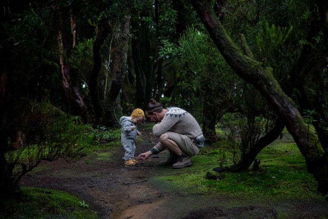 Kit as a child with his father